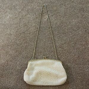 White pearl beaded evening shoulder bag with long gold chain